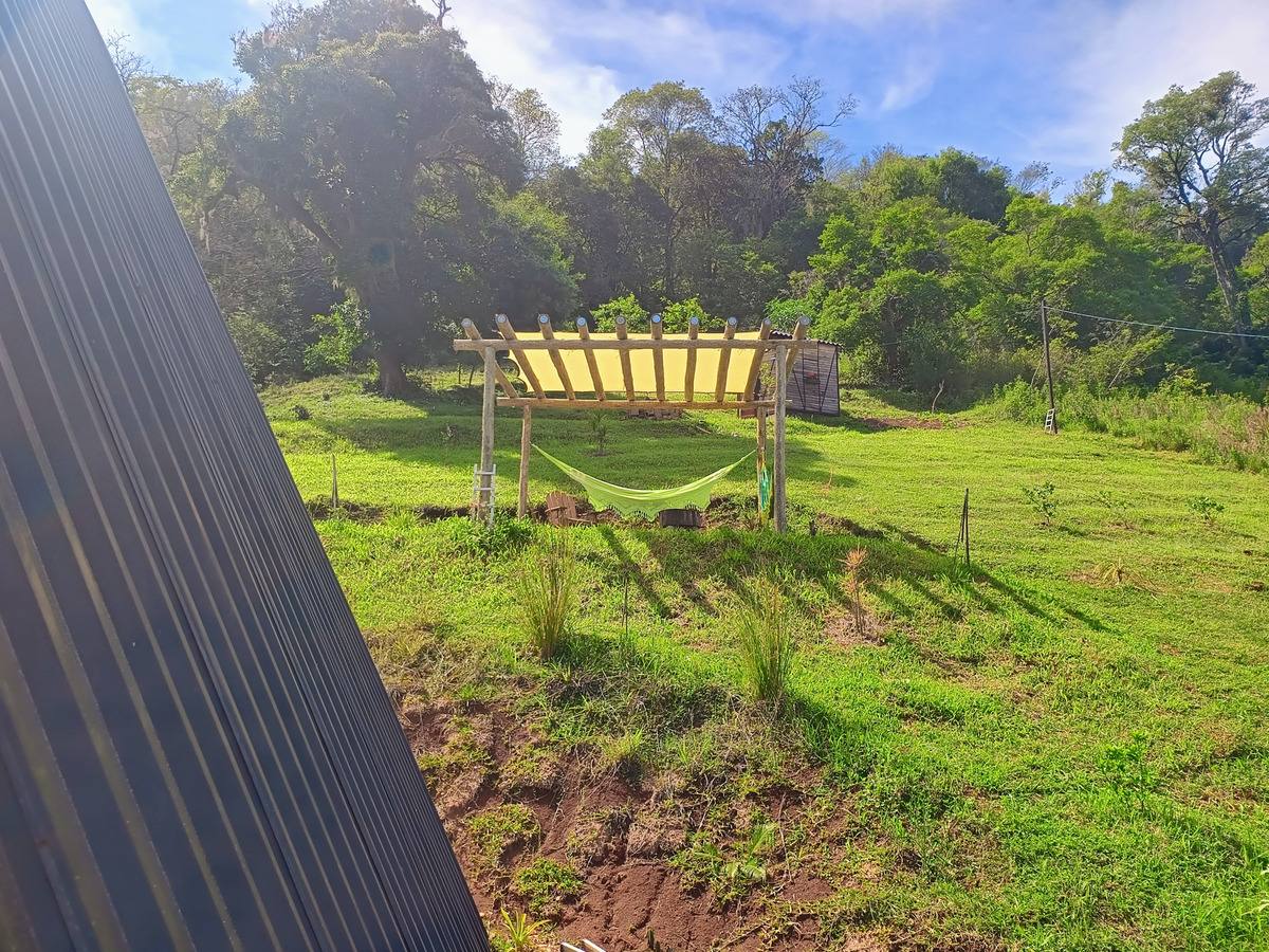 Solaraia · vela em propriedade rural com estrutura de madeira · identidade preservada