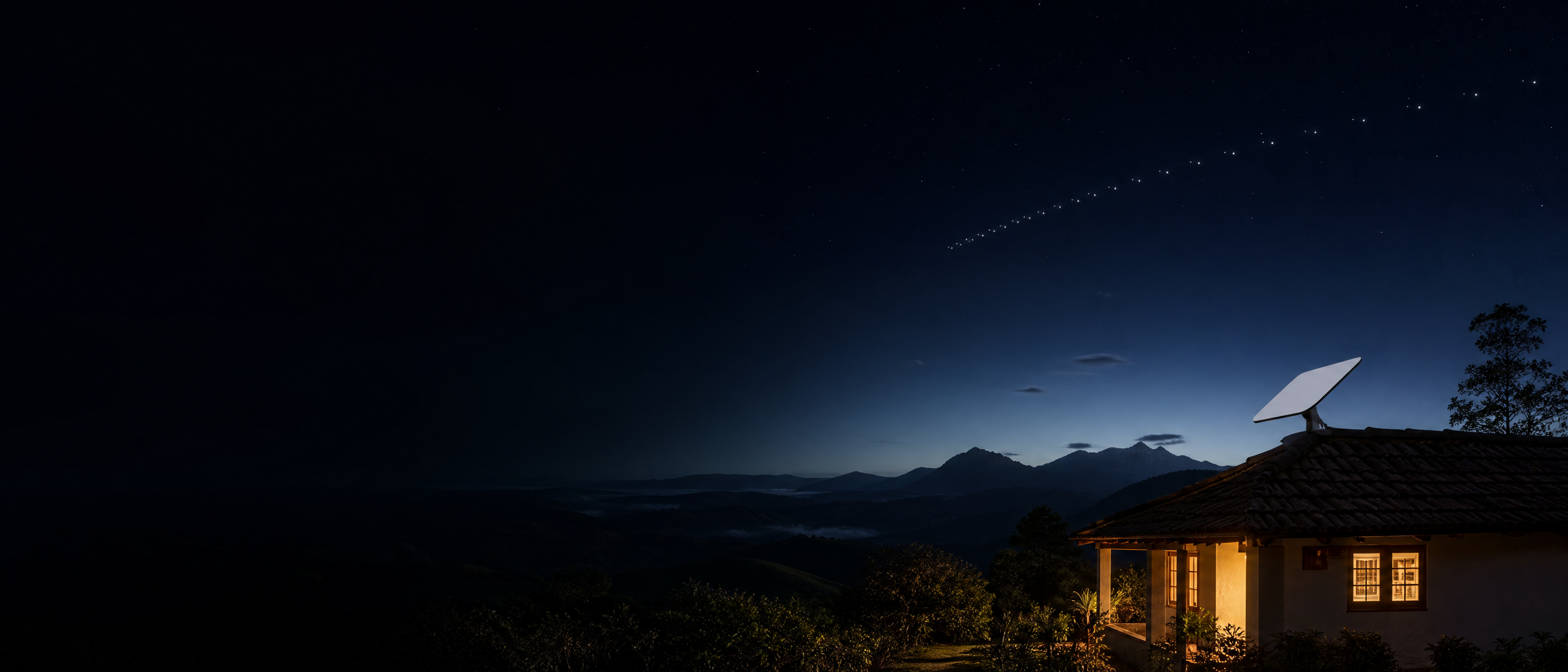 Terminal de internet por satélite em uma residência rural ao entardecer